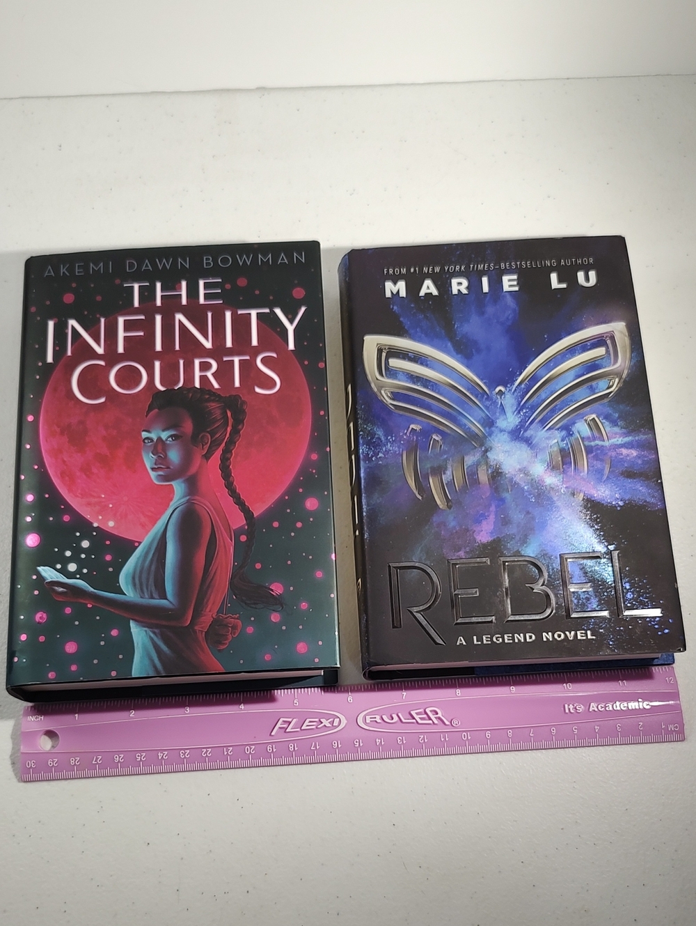 The Infinity Courts By Akemi Dawn Bowman & Rebel By Marie Lu Hard Covers
